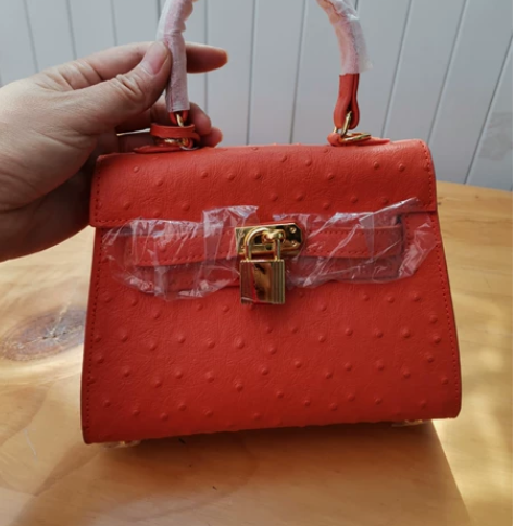 全新女士牛皮包包牛皮压鸵鸟纹凯莉包斜挎包爱...