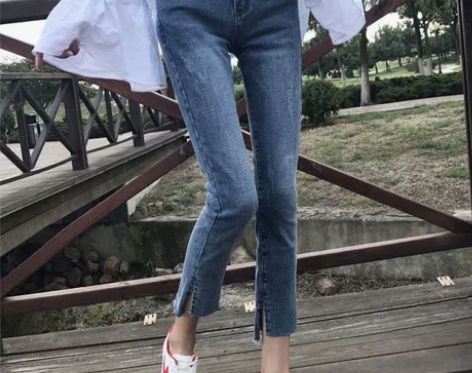 春装女装韩版修身显瘦抓纹弹力九分裤侧开叉破...