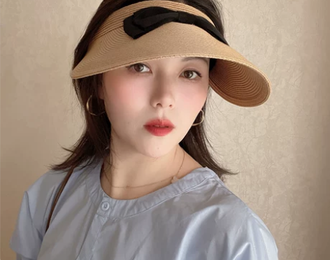 日本春夏蝴蝶结草编空顶帽子女防晒沙滩帽扎马...