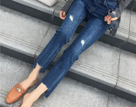高腰微喇叭毛边牛仔裤女九分裤破洞韩版宽松弹...
