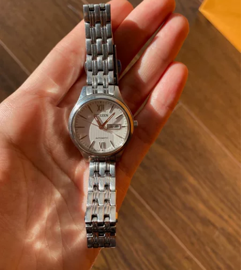 西铁城女士防水机械表，双按式三折扣，精钢表...