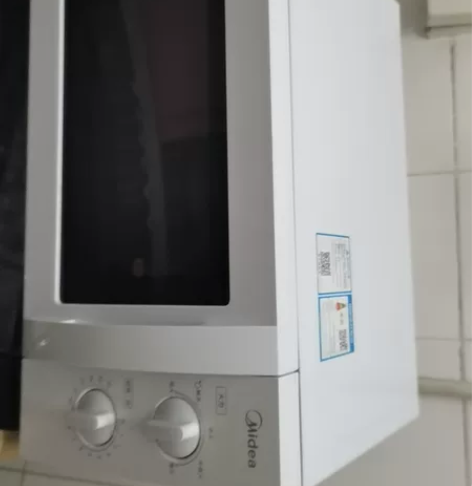 美的微波炉，上边型号，日期都有，实拍图，地...