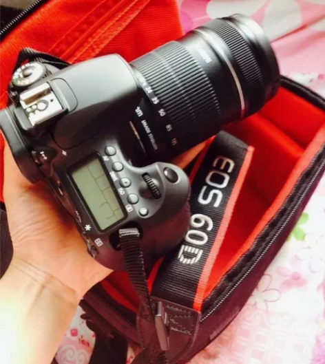 99新的佳能单反相机，原价6000多，现价...