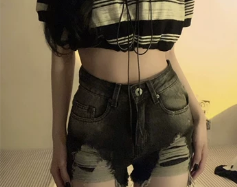 性感水洗破洞毛边牛仔短裤夏季薄款辣妹高腰显...