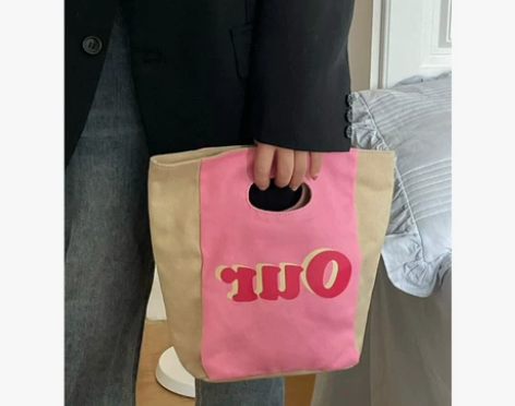 小众设计可爱手拿包托特包休闲通勤饭盒包粉色...