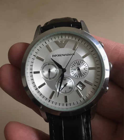 转让一只阿玛尼（六针带日历）石英手表，只限...