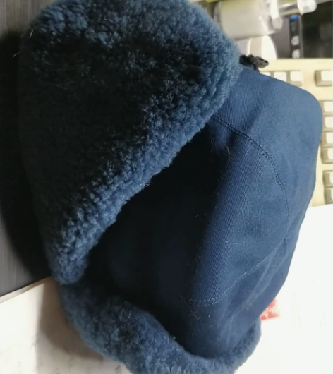 雷锋帽内置羊皮保真空皮帽号码58成色如图，...