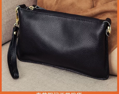 女式手拿包2022新款潮真皮手拎包女小包手...