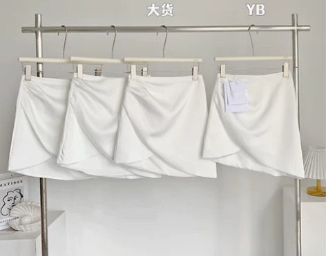 春季白色气质高腰缎面半身裙女设计感不规则显...