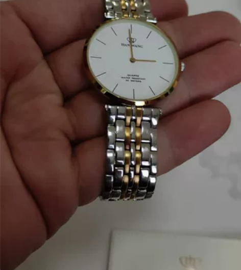 天王手表，正品没怎么戴成色好，包装盒说明说...
