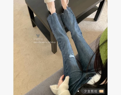 不规则破洞九分牛仔裤女早春2022年新款高...