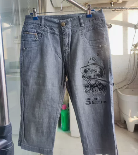 女式夏季七分黑色印花薄款牛仔裤 裤长65c...