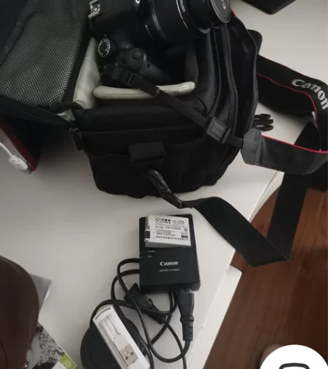 单反像机购买时88500.现低价转让，望有...