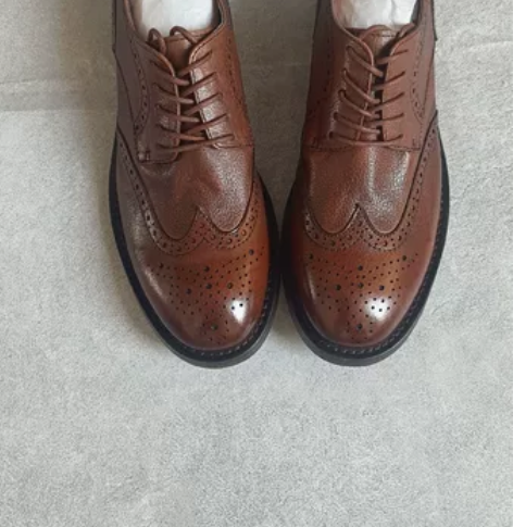 布洛克雕花男鞋 面料:头层牛皮 内里:猪皮...