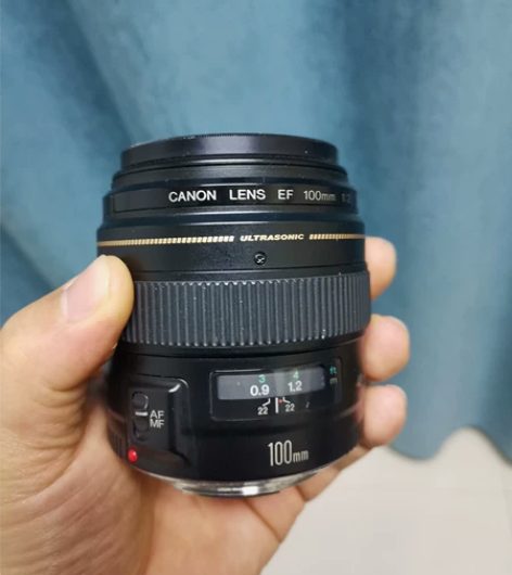 佳能100mm f2 人像定焦镜头 100...