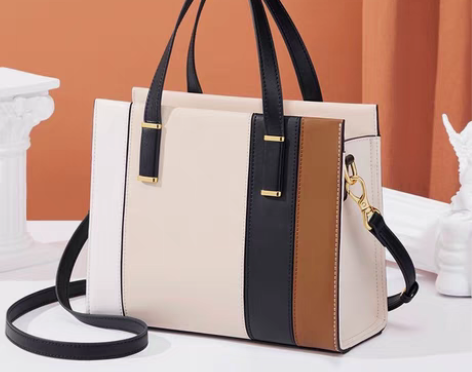 包邮【提供链接假一赔十】蔻一真皮女包包新款...