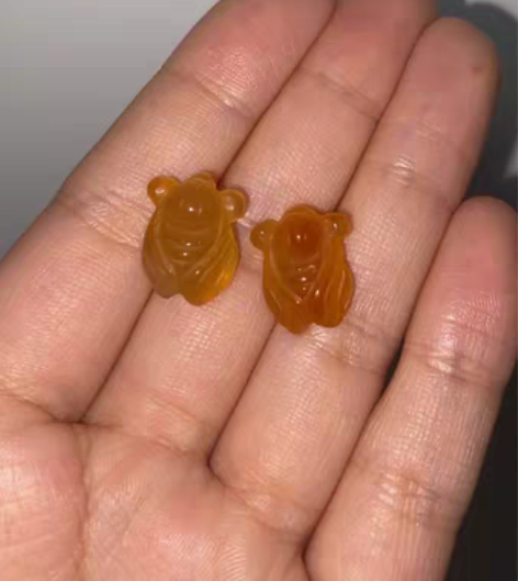 包邮北红逊克玛瑙小金蝉小雕刻 可以做滴溜和...