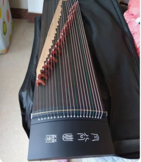 包邮古筝  买回来没用过 全新 配件差不多...