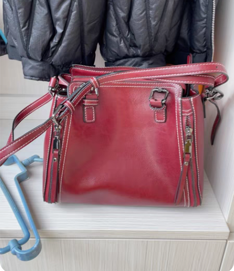 包邮稻草人女士手提包，一次都没用过。唯品会...