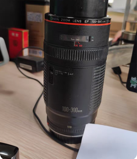 出手一支佳能100–300 5.6l红圈镜...