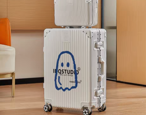 转卖新款行李箱女大学生卡通涂鸦旅行密码皮箱...