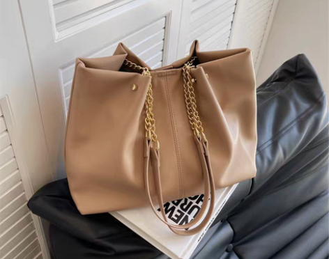 转卖法式通勤大包包女2022新款潮大容量洋...