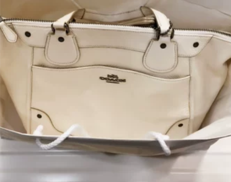 全新闲置coach全新全皮单肩/斜挎铆钉机...