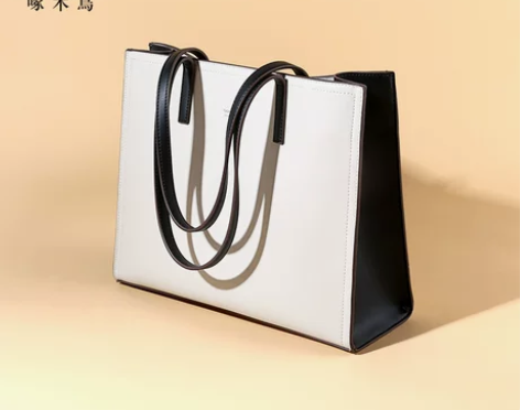 啄木鸟单肩包女2022新款通勤大包大容量黑...