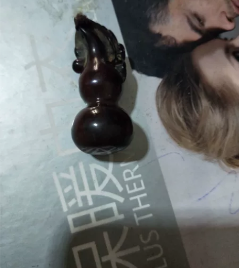小葫芦挂件一个,应该是牛角的,具体年代材料...