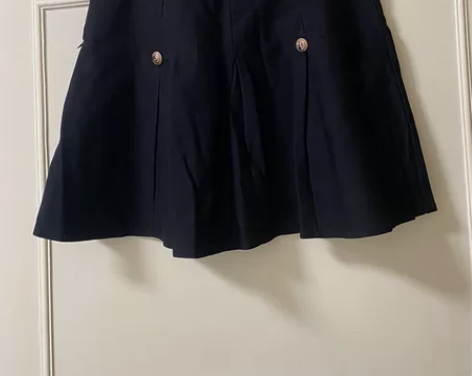 微胖黑钻扣百褶短款半身裙女秋冬遮肉显瘦a字...