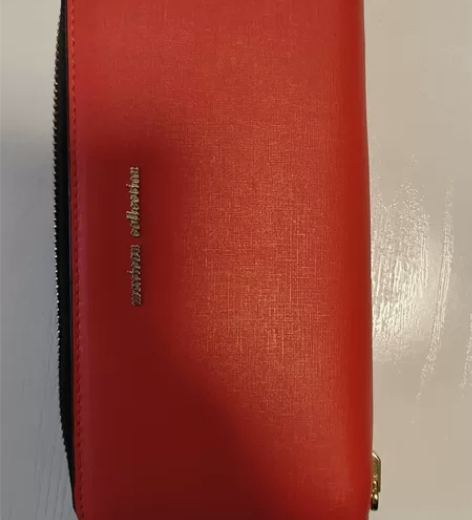 橘红色稻草人女士钱包卡包硬手包，很漂亮，大...