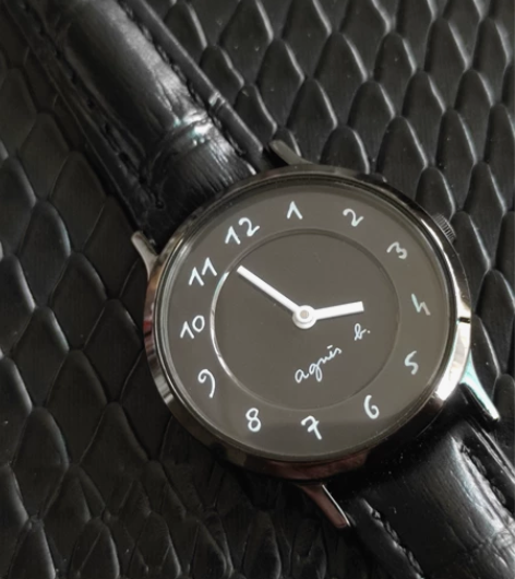 精工旗下agnès b女士二针黑盘石英手表...