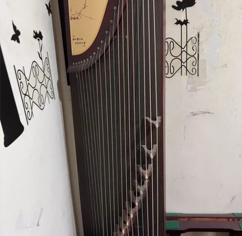 新古筝，未用过，因为朋友送的，家里摆不下了...
