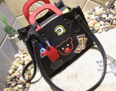 手提包女韩版2016新款个性时尚女士包包百...