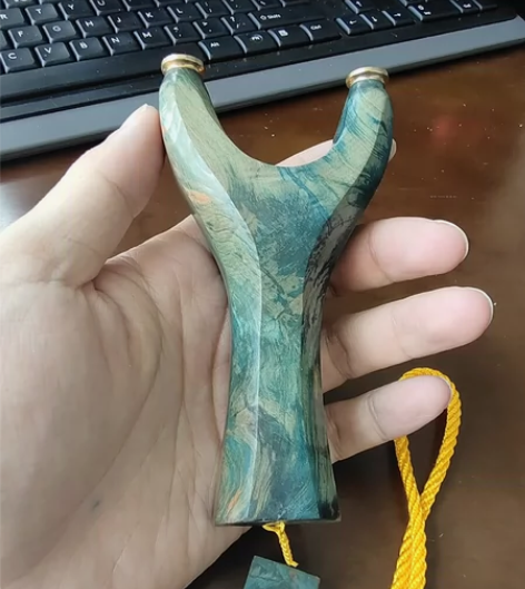 固话木弹弓带个吊坠，弓门6813，弓高13...